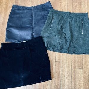 Three skirts: soft black velvet, sophisticated green tweed, gray microsuede.